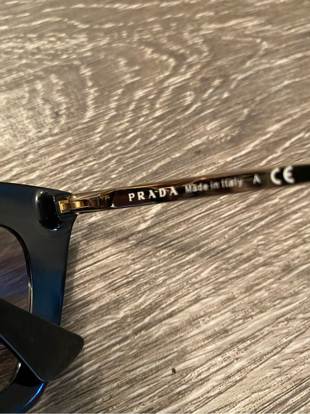Prada Black Frame Cat-Eye Sunglasses with Gold Bridge - Picture 7 of 7